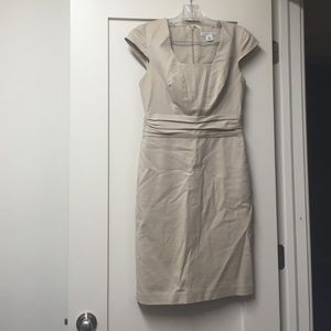A beige formal dress, only worn twice.