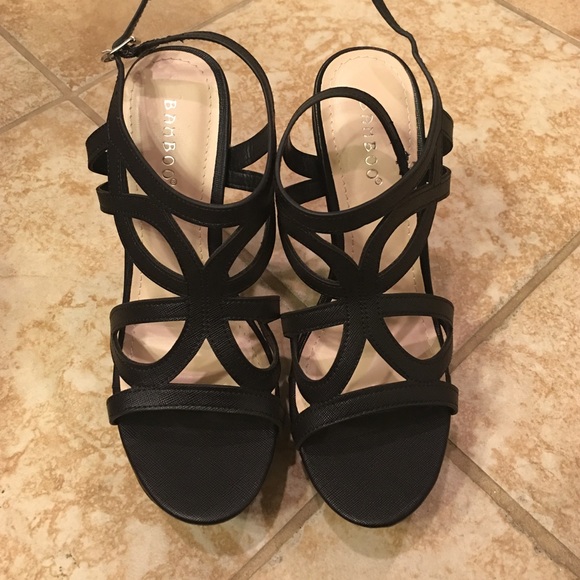 Brand new black wedges