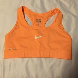 Nike pro bright orange sports bra size small