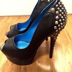 Insatiable studded platform heels