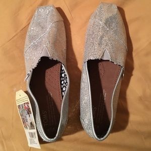 TOMS Silver glitter slip ons - Size 7.5