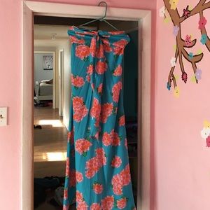 Colorful long dress with orange flowers all arond