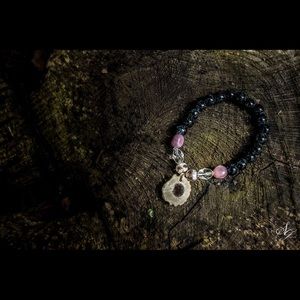 Beautiful beaded bracelet with deer antler charm