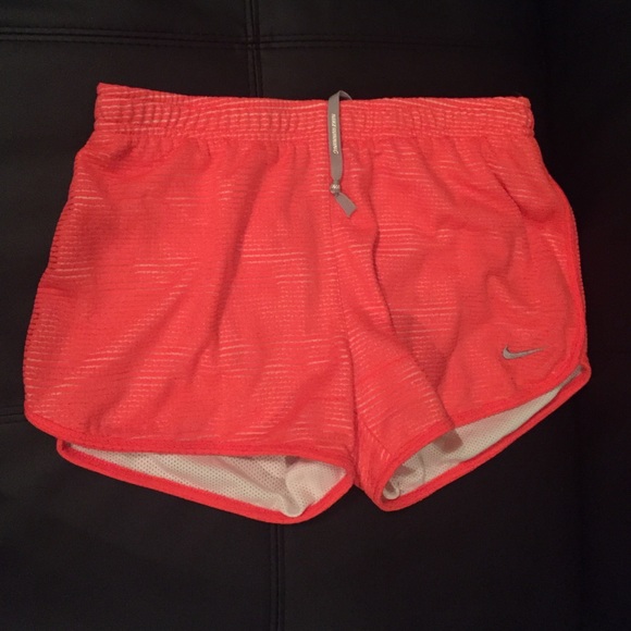 Red Nike shorts