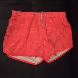 Red Nike shorts