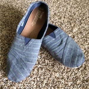 Light denim Toms with seafoam stripes