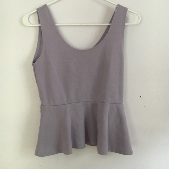 Purple, sleeveless, peplum top. - Picture 1 of 4