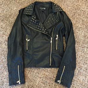 Fux leather studded jacket.