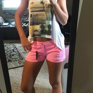Formula neon pink cutoff shorts!