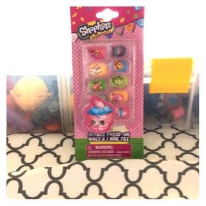 Shopkins press on nails with a nail file