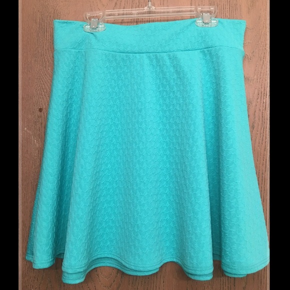 Turquoise colored skater skirt