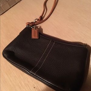 Coach brown and tan leather small wristlet