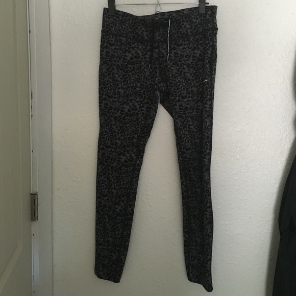 Nike Dri-Fit pants cheetah print size large
