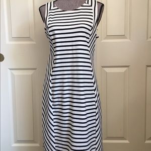 Black and white striped sheath dress.