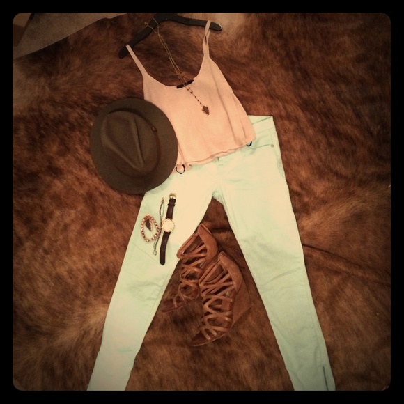 Soft teal skinny jeans with ankle zippers