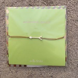 Never worn Stella and Dot gold arrow bracelet