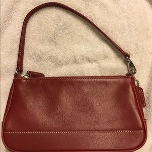 Small red leather Coach purse