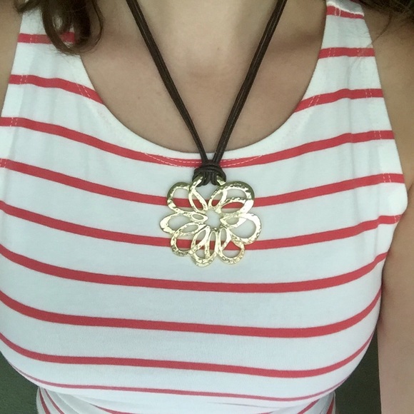 Faux leather necklace with gold flower