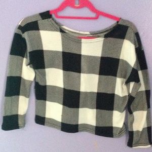 Checkered black and white shirt.