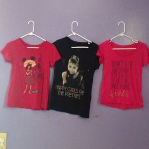Three T-shirts.