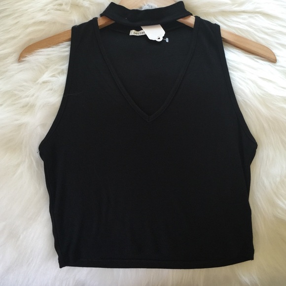 Mock neck top with a deep v plunge