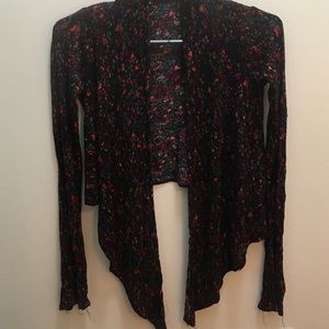 Floral sweater. Crop in back and flows in front.