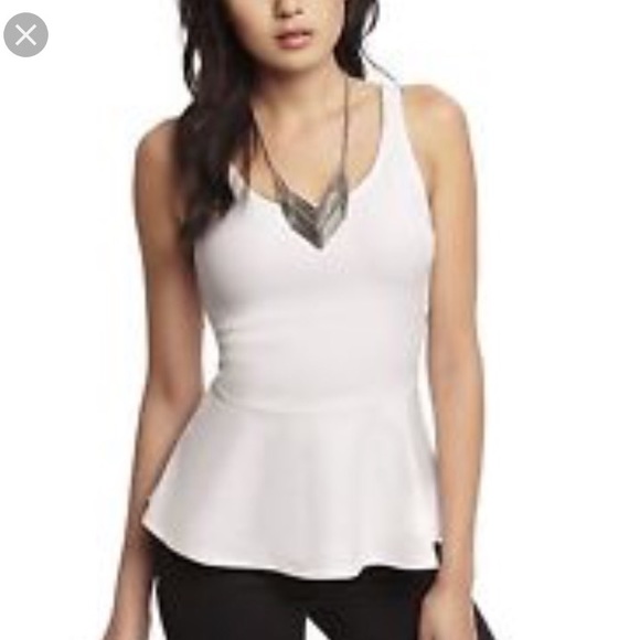All white peplum top from express.