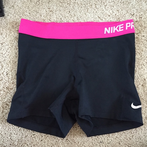black nike pro shorts with pink band