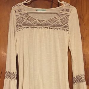 Maurice's long tunic