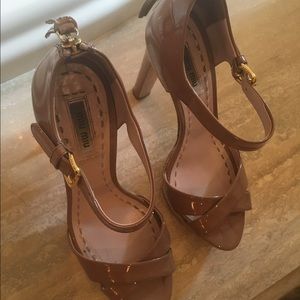 This is a AUTHENTIC MIU MIU high heel. Nude color