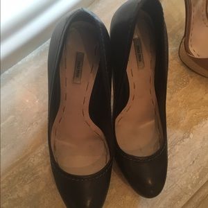 This is a AUTHENTIC MIU MIU BLACK HELLS SHOES