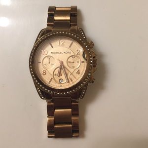 Michael Kors female gold watch