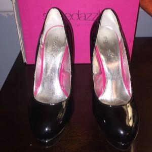 Pink bottom patten leather heels