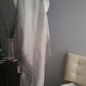 Long grey and white scarf.