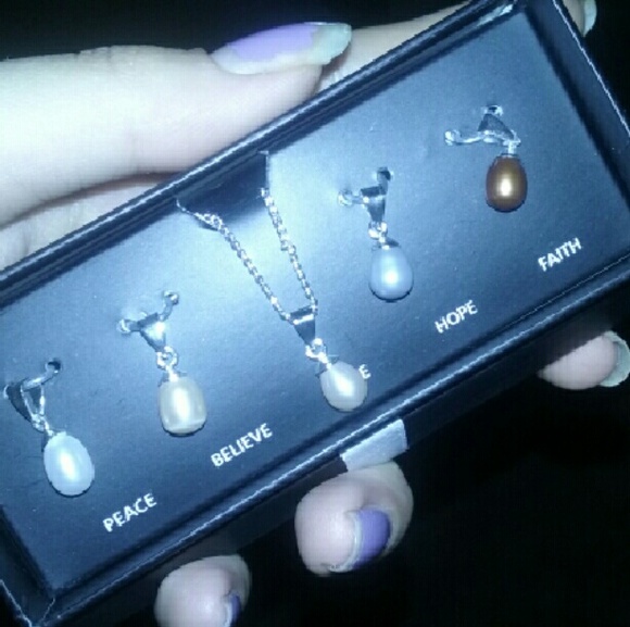 NWT necklace with changeable pendants