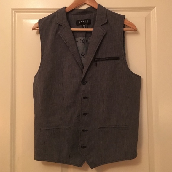 21 Men Dark Vest. Hardly warn.