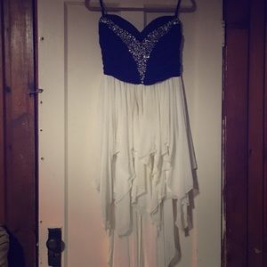 I'm selling a black and white tube prom dress.