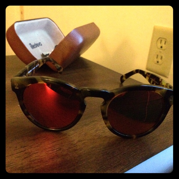 Tortoiseshell sunglasses with pink frames