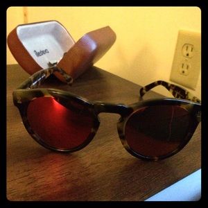 Tortoiseshell sunglasses with pink frames