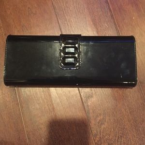 Beautiful, simple black LANCÔME clutch