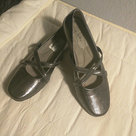 Silver patent leather shoes