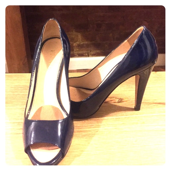 Navy Prada peep toe pumps