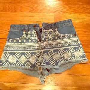 Denim shorts with Aztec print