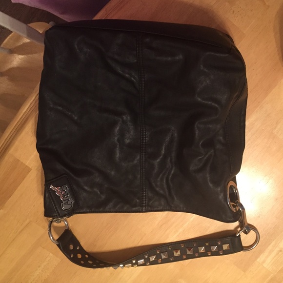 Carlos Santana purse