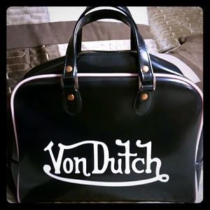 Von Dutch Bowling Bag black with pink trim.