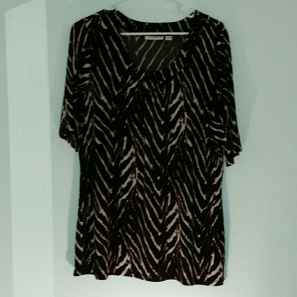 Elbow sleeve top with pleated neckline.