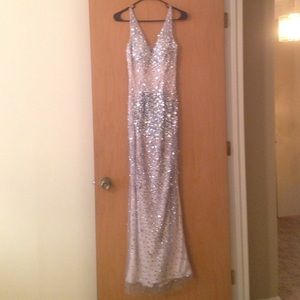 Silver, beaded, sleeveless, prom gown, worn once.