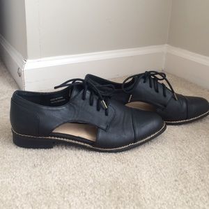 Black oxfords with gold trim