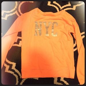 NYC sweater makes you look tan.!!