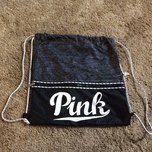 pink string backpack